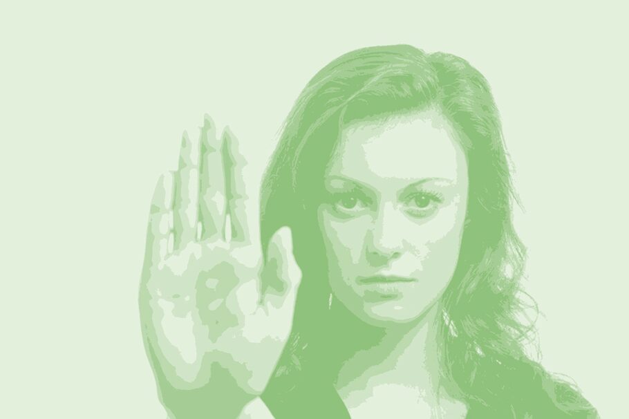 Frau mit ausgestreckter Hand - Stoppzeichen