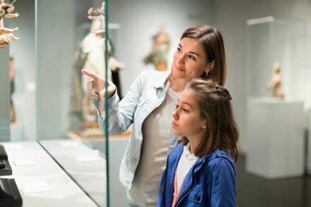 Woman and child in a museum